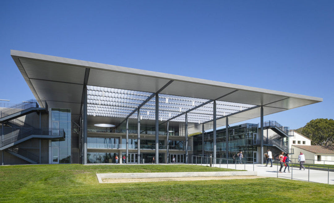 view of modern library building with art display spaces inside, equipped with art hanging systems