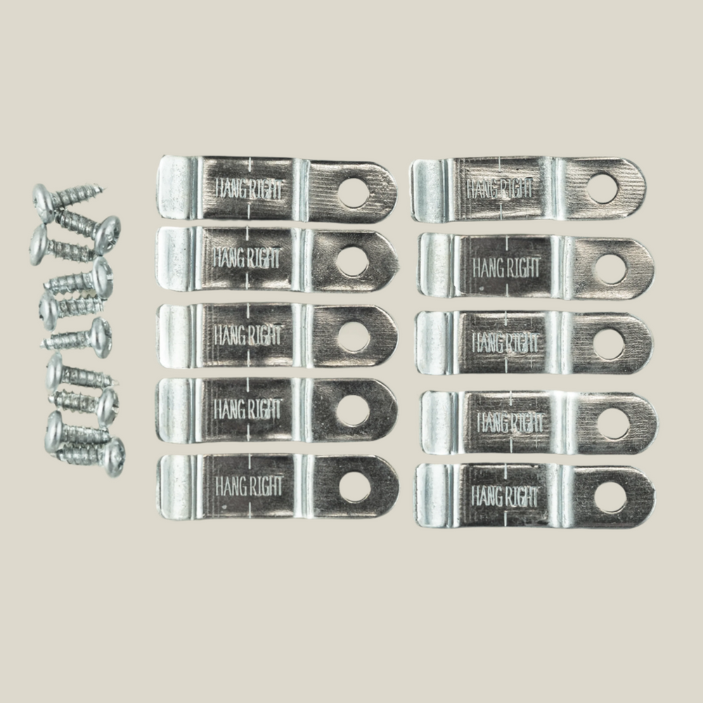 HangRight clips, used to keep artworks hanging straight on picture hanging systems