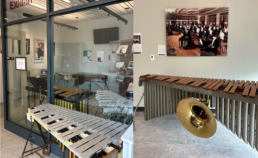 Museum exhibits of mallet percussion instruments, with photos and graphics displayed on wall using art hanging system