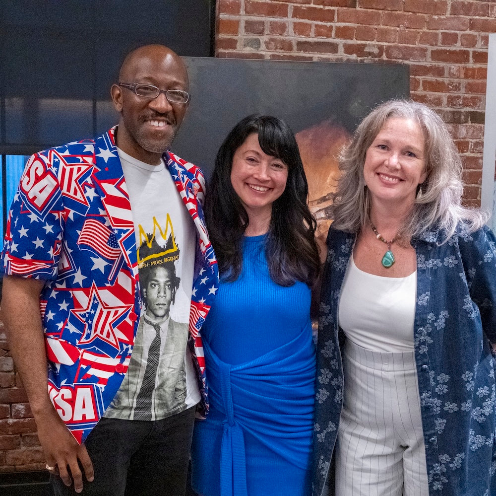 Three art professionals after presentation on art hanging and art exhibitions