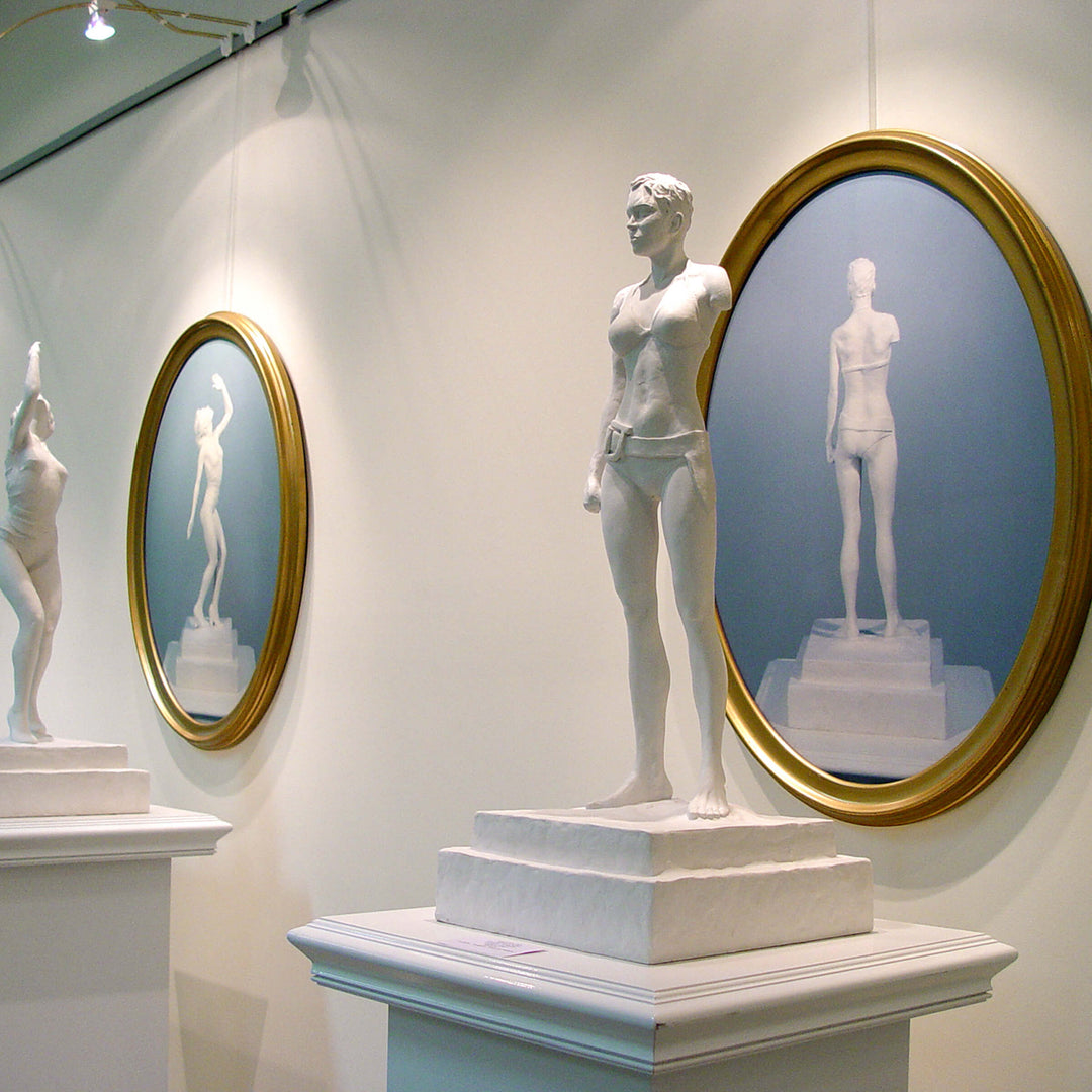 Statue of a man on a pedestal with mirrors reflecting other statues.