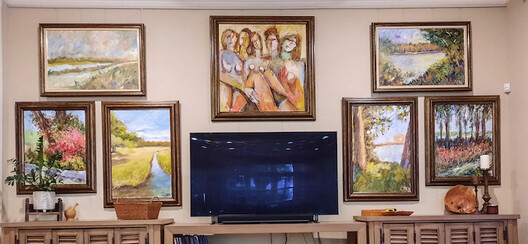 Art Wall in home hung on picture hanging system