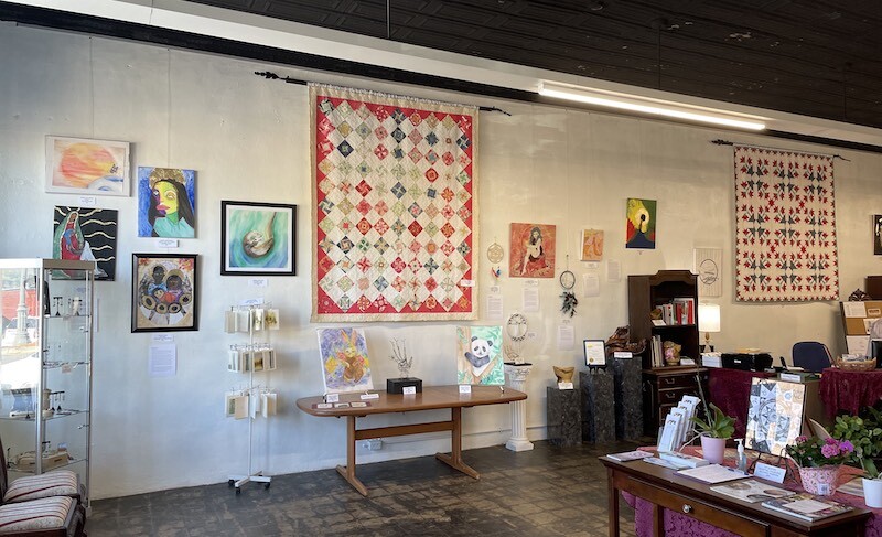 Interior view with art gallery hanging system at Mountain Valley Arts Council gallery
